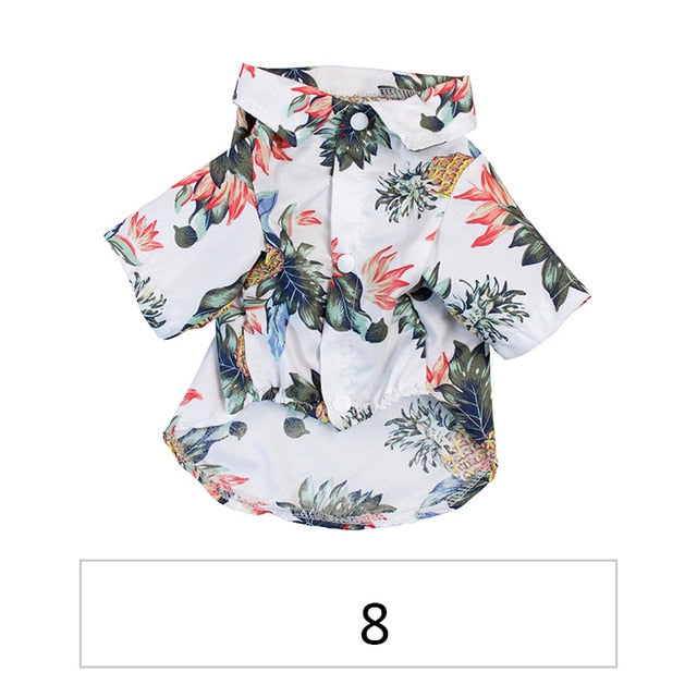 Front view of a white tropical pet shirt with pineapple and red floral print labeled 8