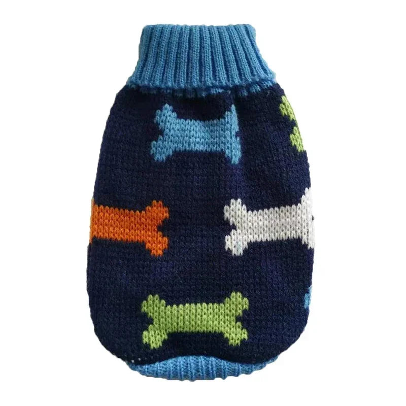 Navy knit pet sweater with multicolored bones and blue ribbed trim