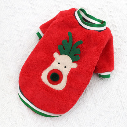 Red reindeer fleece pet sweater displayed on a white textured surface