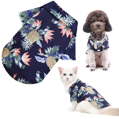 Navy tropical pet shirt shown alongside a dog and cat wearing it