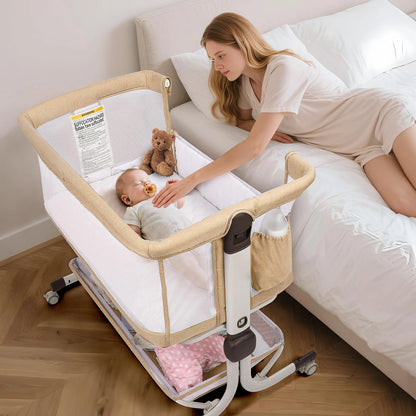 Woman leaning over a beige bedside bassinet with a baby and teddy bear inside.