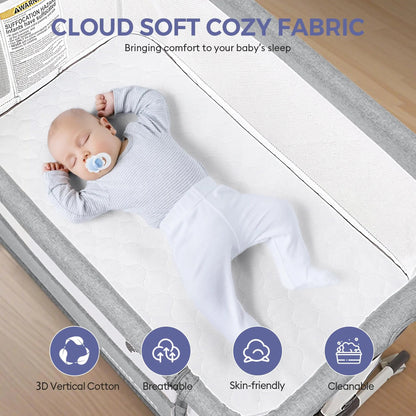 Baby resting in a gray bedside bassinet with white bedding, under a “Cloud Soft Cozy Fabric” heading.
