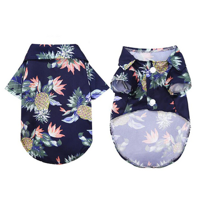 Front and back views of a navy tropical pet shirt with white snap closures